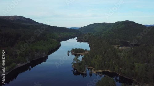 Aerial footage of the scenic Glen Affric nature preserve during daytime in Cannich, Scotland, UK photo