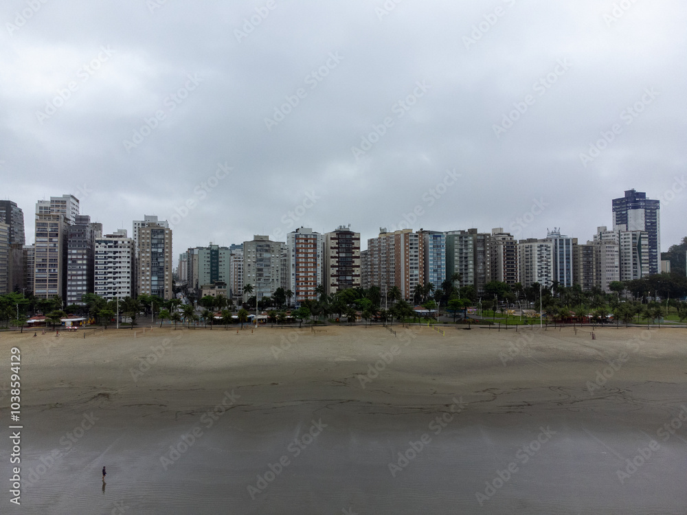 Coastal city on a cloudy day with drone photography, Santos and São Vicente