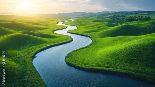 Aerial View of Curving River Through Green Landscape