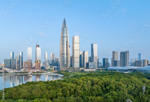 Fototapeta Naklejka Na Ścianę i Meble -  Park in city of Shenzhen China,beautiful mix of green trees combined with buildings, modern architecture
