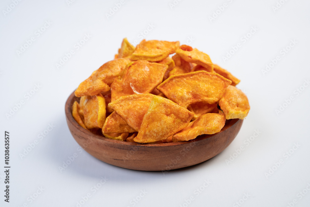 A bowl of fried food with a lot of pieces in it