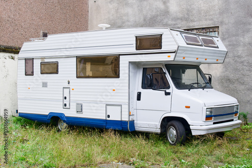 Motorhome abandoned and dumped near public street waiting to be removed