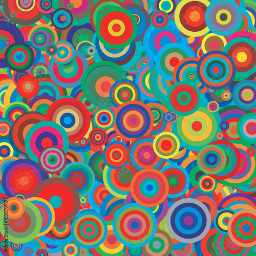 background made up of multiple circles in a variety of sizes and colors reminiscent of the vintage 70s and 80s aesthetic