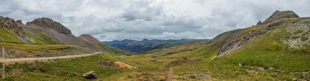 mountain tundra valley with road to distant peaks mountain tundra valley with road to distant peaks