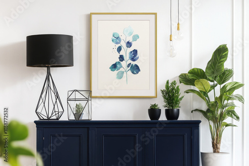 stylish interior featuring dark blue cabinet adorned with decorative plants, modern lamp, and beautiful framed artwork. serene atmosphere is enhanced by elegant design elements