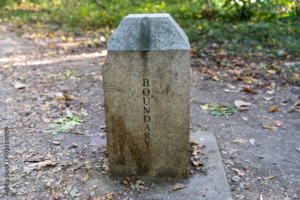 Boundary stone, marking the state boundary for Maryland and Washington DC - district of columbia Boundary stone, marking the state boundary for Maryland and Washington DC - district of columbia