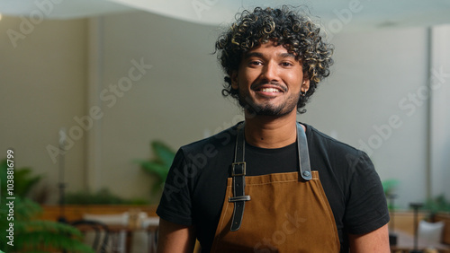 Obraz na plátně Opening small business employment Indian Arabian ethnic male man guy in apron wa