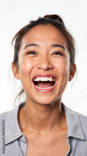 Excited Asian Person Expressing Joy on a Vibrant White Background – Enthusiastic Portrait for Emotions, Celebrations, and Marketing Campaigns