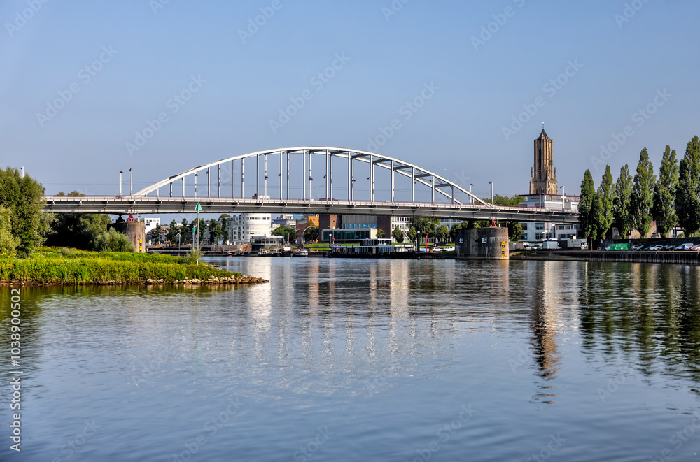 Fototapeta premium Arnhem, Netherlands - August 1, 2024: The John Frost Memorial Bridge over the Rhine River in Arnhem, Netherlands