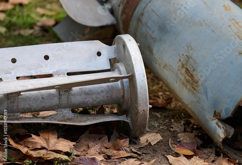 The tail section of a 220 mm rocket for the Uragan rocket fire system on a city flowerbed in Mykolaiv photo