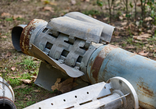 The tail section of a 220 mm rocket for the Uragan rocket fire system on a city flowerbed in Mykolaiv