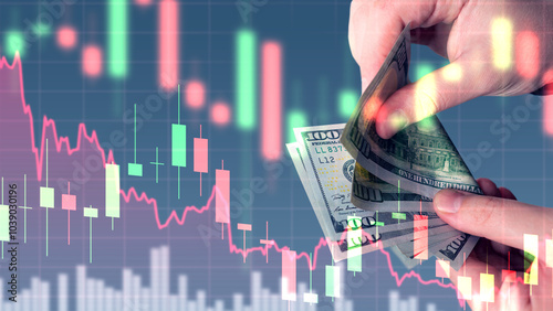 Dollars in hands of man. Fluctuations in price of American currency. Trading charts near cash dollars. Investor recalculates money earned. Buying and selling dollars in USA. Money USD