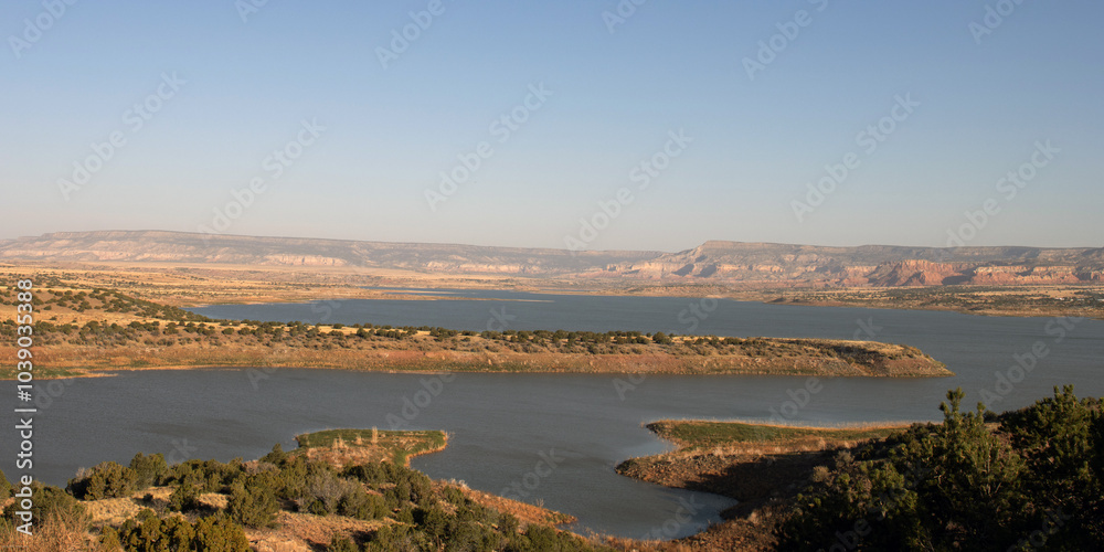 Panoramic view of Abiquiu Lake, an Army Corps of Engineers reservoir in northern New Mexico, with Ghost Ranch at far right in distance Panoramic view of Abiquiu Lake, an Army Corps of Engineers reservoir in northern New Mexico, with Ghost Ranch at far right in distance