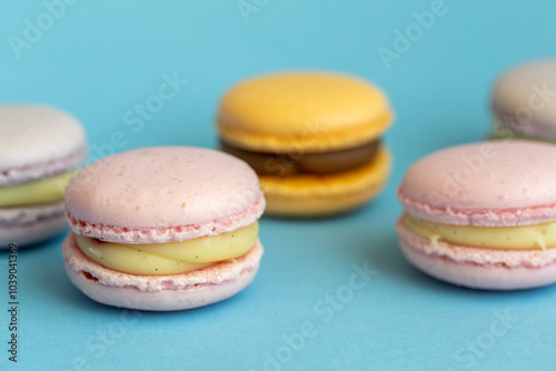 fleet of delicious almond macaroons on plain background, delicate dessert