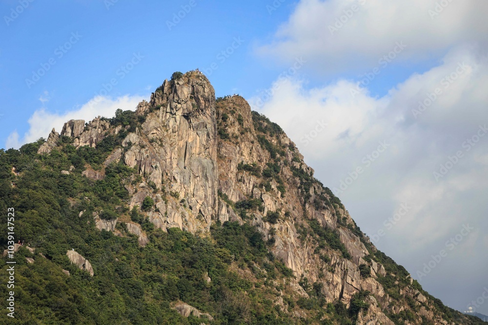 Majestic View of Lion Rock in Hong Kong Under a Clear Sky Majestic View of Lion Rock in Hong Kong Under a Clear Sky
