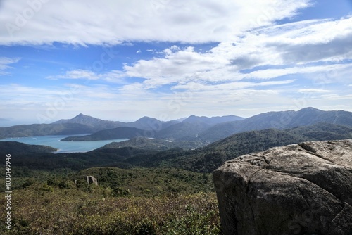 Scenic Mountain View with Rocky Foreground and Distant Lakes