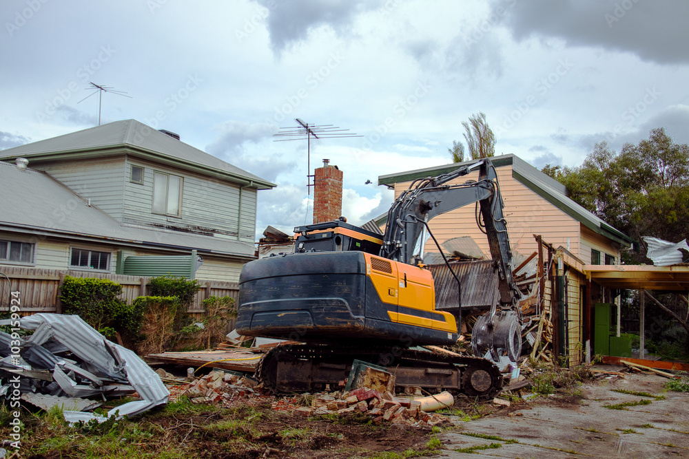 liquidation and demolition of a house by an excavator liquidation and demolition of a house by an excavator