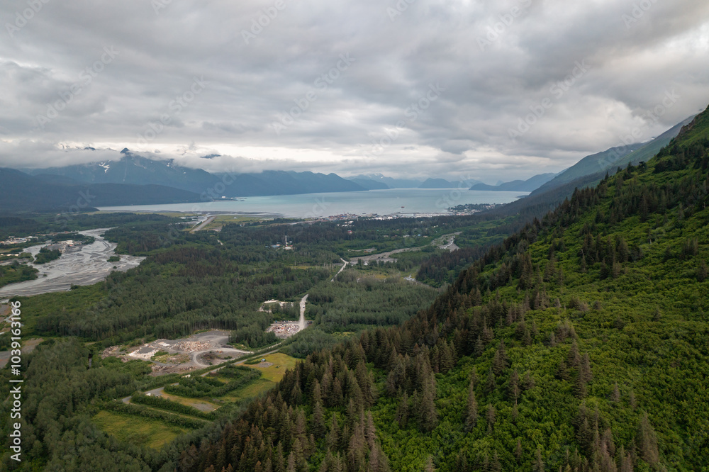 Fototapeta premium Aerial view of harbor town Seward, Alaska mountain landscape with Resurrection Bay and Gulf of Alaska ocean water