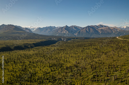 Aerial view of Chugach Mountains landscape with creek valley in Alaska wilderness near scenic Glenn Highway and Matanuska Glacier photo