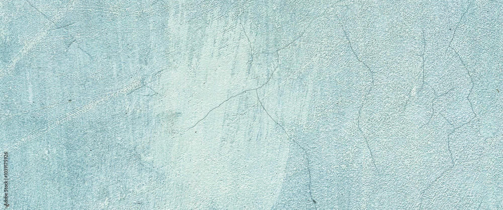 Obraz premium Close-up shot of a light blue concrete wall with a fine textured surface and subtle cracks. Classic retro texture for poster banner background and other digital needs.