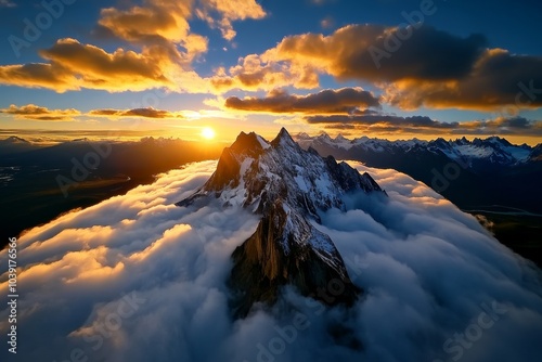 Golden light of dawn illuminating the Torres del Paine, casting long shadows over the valleys and creating a breathtaking view