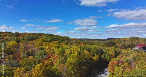 Late afternoon aerial autumn video of the area surrounding the Yorktown Heights, NY, USA and the the New Croton Reservoir.  10-16-2024