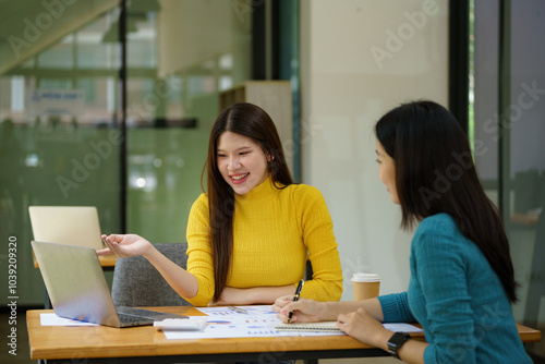 University students, study on campus laptops, research and education tests, exam books, and course projects. Young college students are learning online, technology, and knowledge in the cafe.