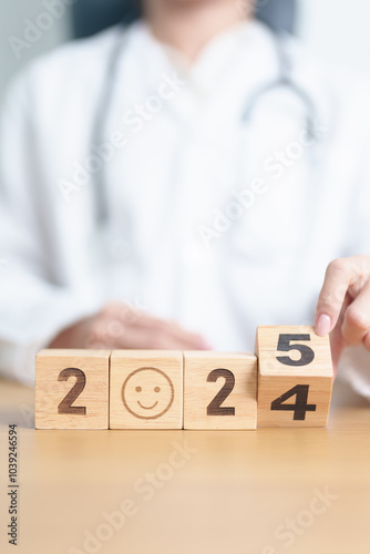 2024 end year to Happy New Year 2025 with Smile block against doctor. Health, Healthcare insurance, medical Satisfaction, feedback, Review, mental health, wellbeing, wellness and good year concept