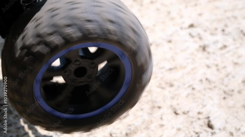 Videography of motion wheels of Remote Control Car. Footage of children's car toys. Toys and Hobbies. Toy Wheels. Children's entertainment. Closeup video. HD 4K Resolutions Video. Videography of motion wheels of Remote Control Car. Footage of children's car toys. Toys and Hobbies. Toy Wheels. Children's entertainment. Closeup video. HD 4K Resolutions Video.