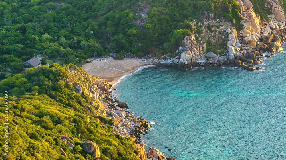 Obraz premium Beautiful Nui Chua national park beach with turquoise color water and Vinh Hy bay, during summer in Ninh Thuan, Vietnam.