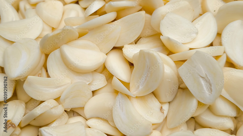 Sliced ​​garlic for background. Indian food.