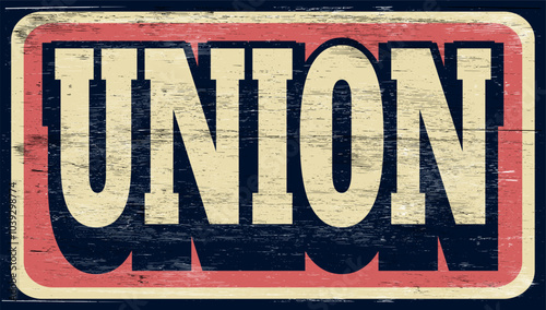 Aged and worn union sign on wood