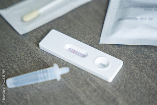 Rapid Antigen Test kit with with negative result during swab COVID-19 testing. Coronavirus Self nasal or Home test, Autumn exacerbation of viruses photo