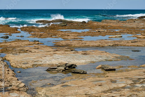 Wallpaper Mural This rocky beach offers a myriad of rock-pools often teemed with life - Marengo, Victoria, Australia Torontodigital.ca