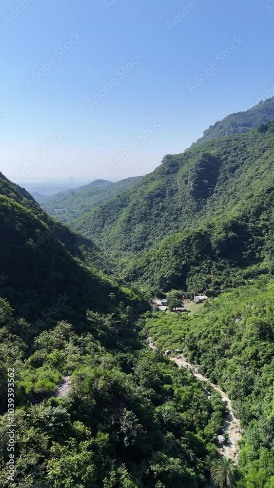 4k drone shot of margalla hills in Islamabad Pakistan. green forested mountain. 4k drone shot of margalla hills in Islamabad Pakistan. green forested mountain.