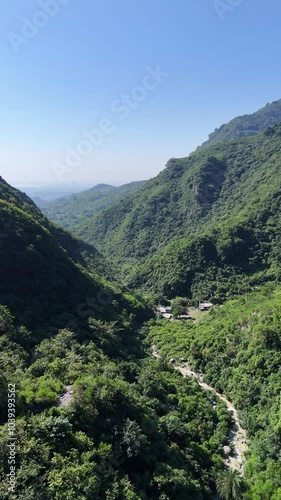 4k drone shot of margalla hills in Islamabad Pakistan. green forested mountain. photo