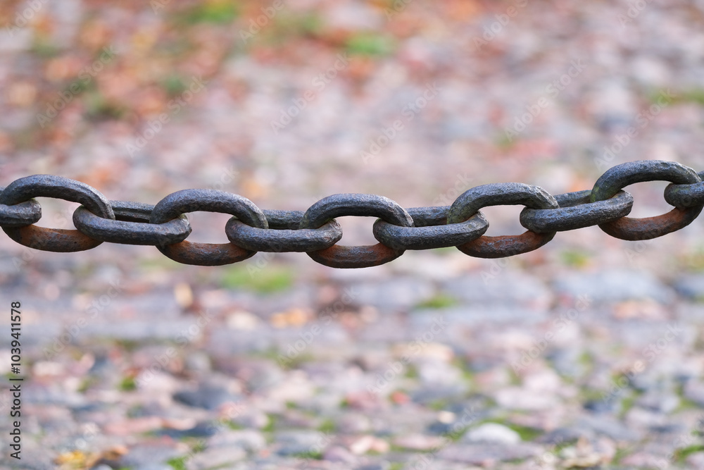 A strong rusty metal chain