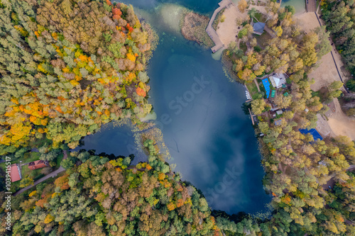 Aerial autumn morning view of colouful trees, forest, Green lakes (Zalieji ezerai) in Vilnius, Lithuania photo