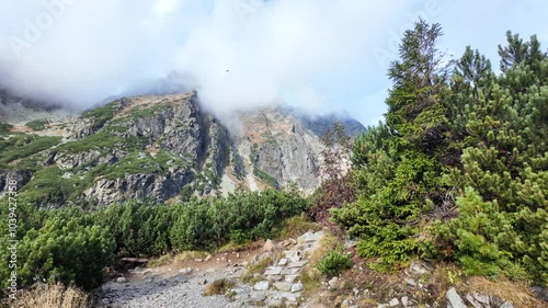 Majestic rocky mountains immersed in clouds, Tatras.