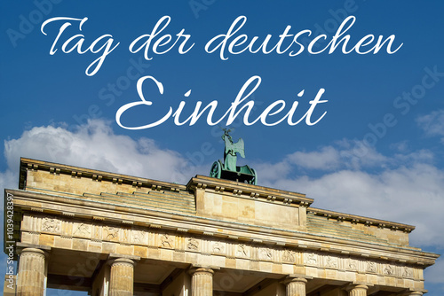 Brandenburger Tor in Berlin mit Schriftzug TAG DER DEUTSCHEN EINHEIT photo