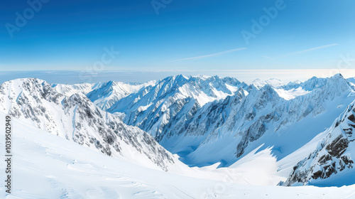 vast snowy mountain range under clear blue sky showcases breathtaking beauty of nature. pristine snow and majestic peaks evoke sense of tranquility and wonder