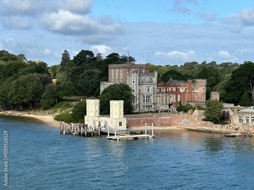 Castle and the dock on the coast of the Atlantic Ocean, Brownsea Island, Dorset, England, United Kingdom, July 2023 photo