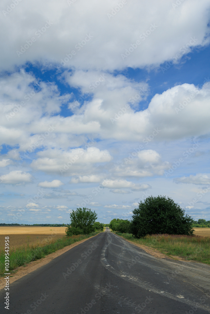 Wide road, highway, sun and blue sky on a summer day. Wide road, highway, sun and blue sky on a summer day.