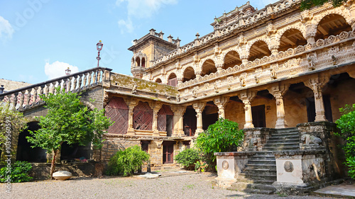 View of the beautifully carved Naulakha Palace, Gondal, Rajkot, Gujarat, India. photo