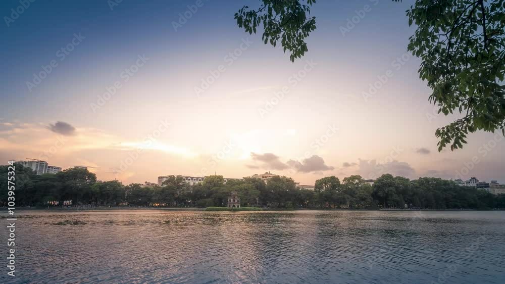 Hoan Kiem Lake ( Ho Guom) or Sword lake in the center of Hanoi in the fog in the morning. It is a famous tourist place in Ha Noi city, Vietnam Hoan Kiem Lake ( Ho Guom) or Sword lake in the center of Hanoi in the fog in the morning. It is a famous tourist place in Ha Noi city, Vietnam