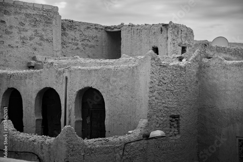 Detail of a big adobe house in Tafilalet oasis in Morocco, North Africa. The largest oasis in the world. Ziz River in the middle of the desert between the cities of Erfoud and Rissani photo