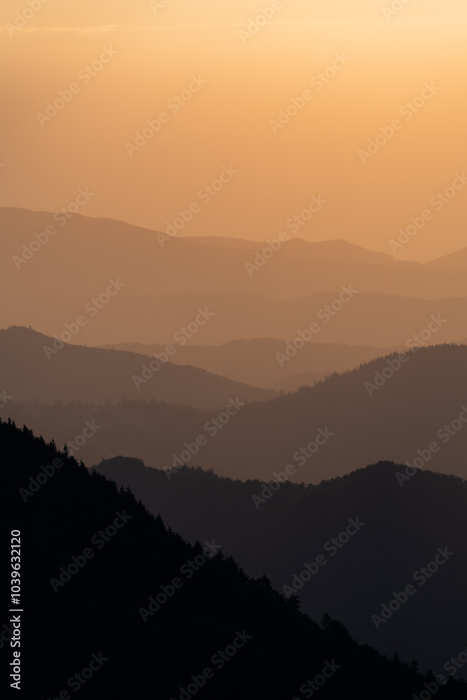 Fototapeta premium sunrise in the mountains, beautiful sunrise with mountain silhouette