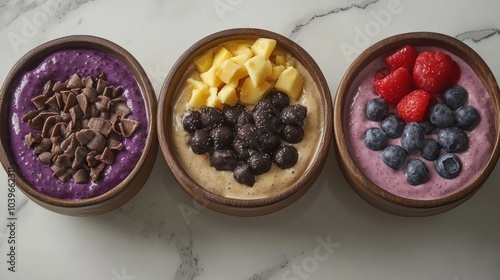 Colorful Smoothie Bowls with Fresh Fruits and Toppings photo