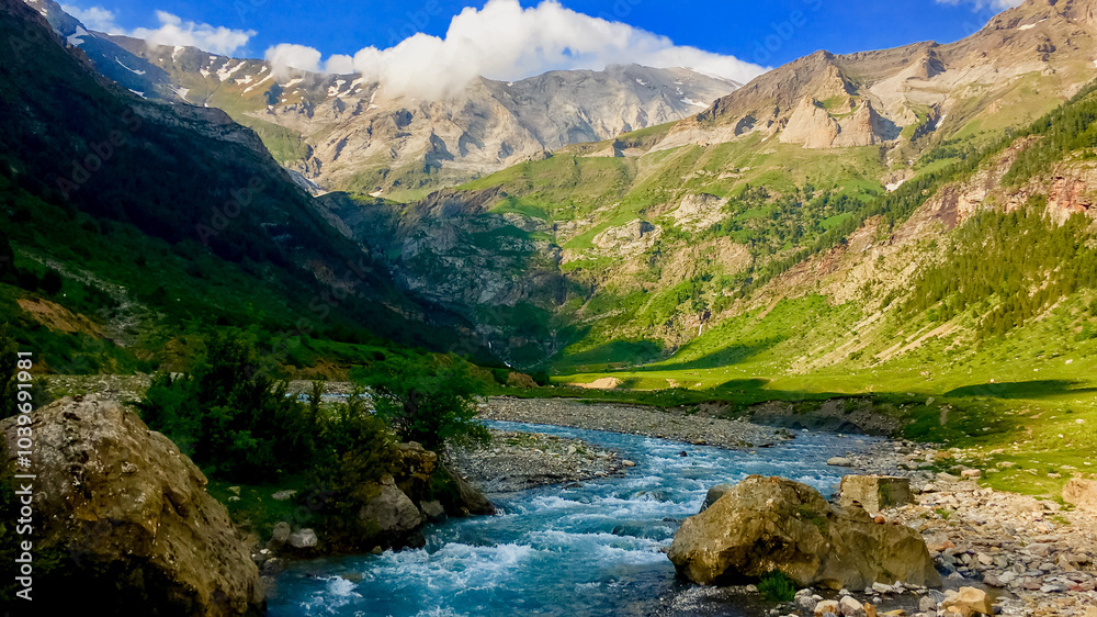 A serene mountain stream winds through lush green valleys, embodying tranquility and nature escape, ideal for promoting Earth Day awareness A serene mountain stream winds through lush green valleys, embodying tranquility and nature escape, ideal for promoting Earth Day awareness