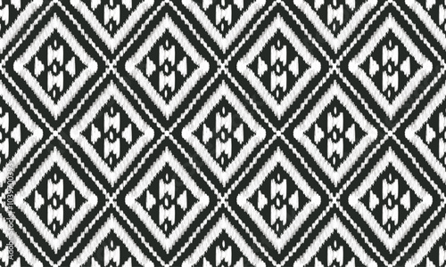 Ikat, Resist dyeing yarn, geometric shapes, bold colors. Repeating diamond pattern with central motif. Often used in textiles like scarves, rugs, and clothing.